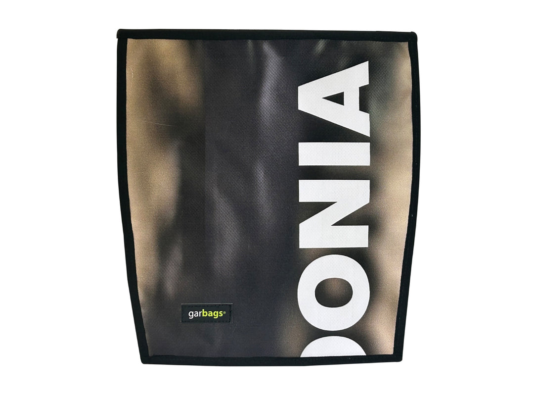 extraflap M publicity banner brown & white letters