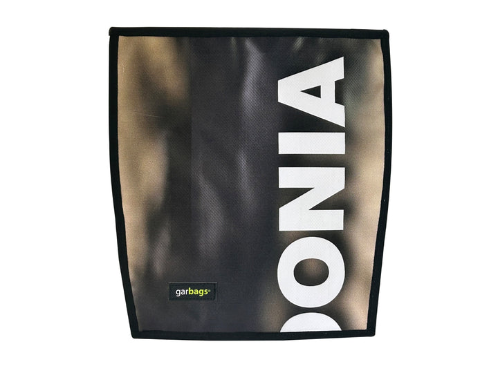 extraflap M publicity banner brown & white letters