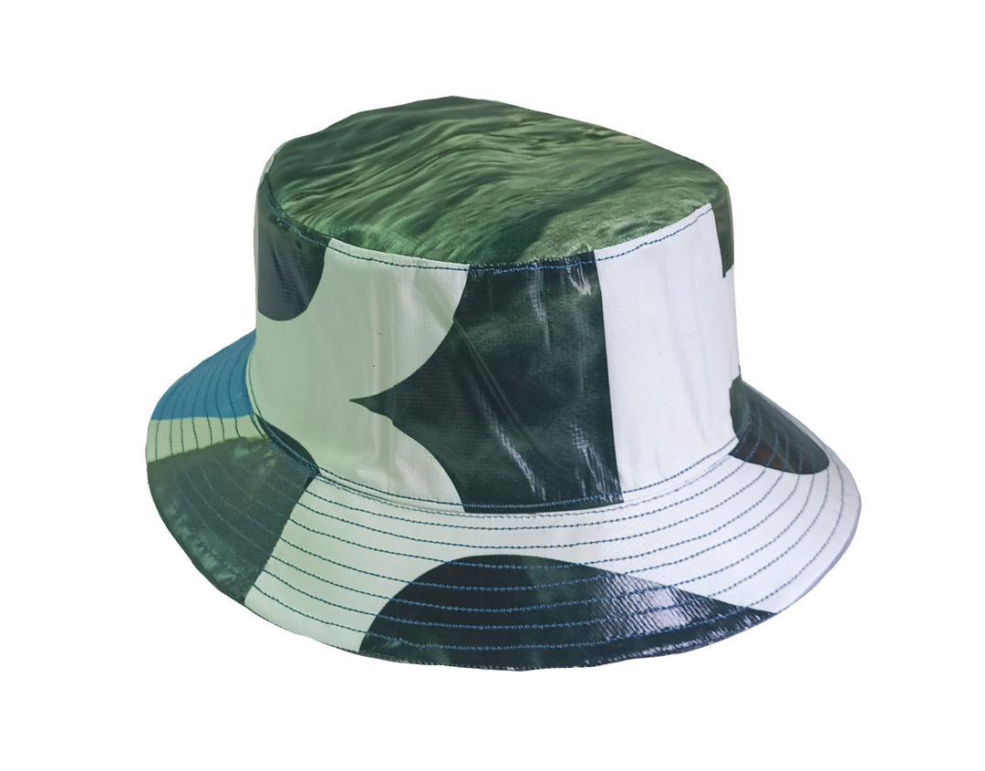 Bucket Hat publicity banner black and white & green leaves