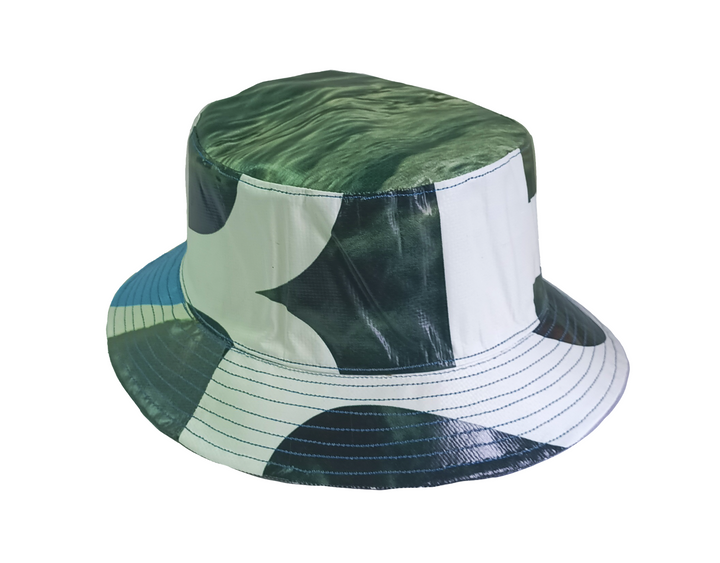 Bucket Hat publicity banner black and white & green leaves