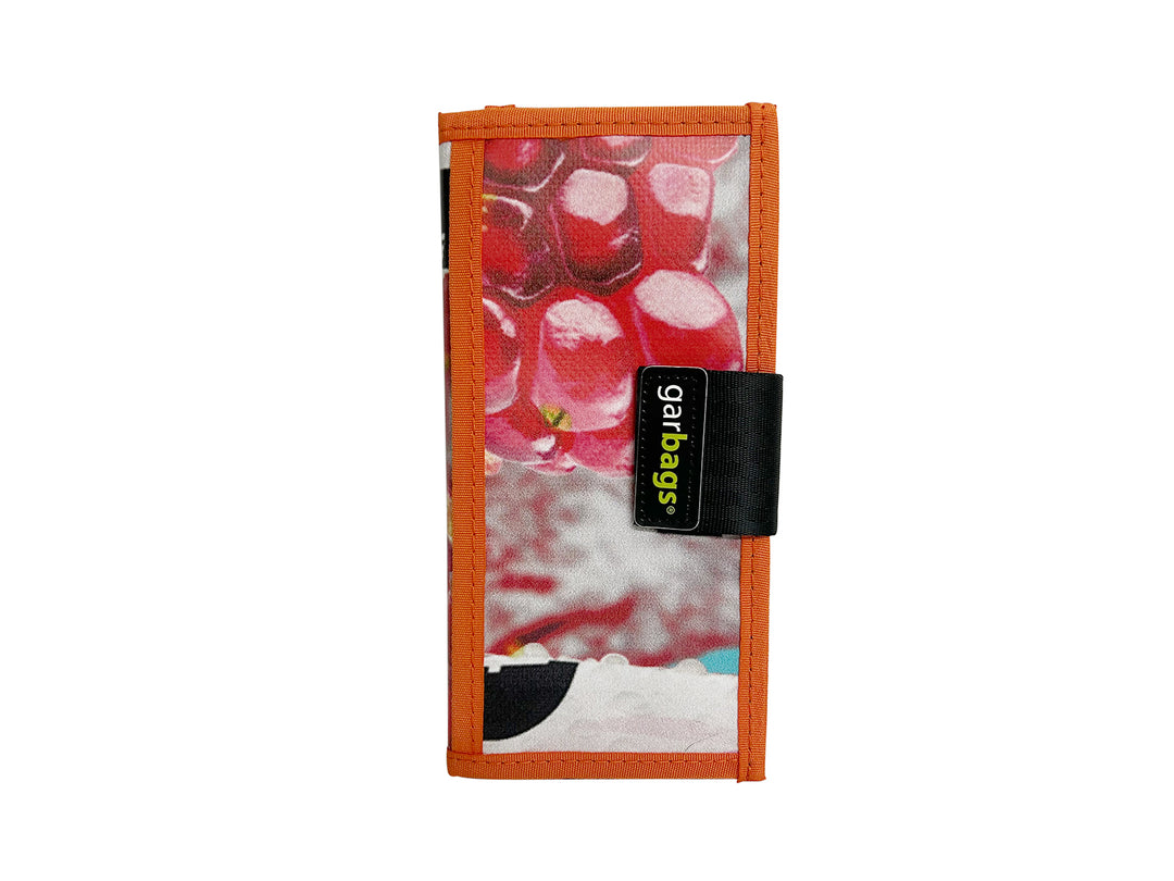 document holder vibrant orange and white, adorned with a juicy red berry design