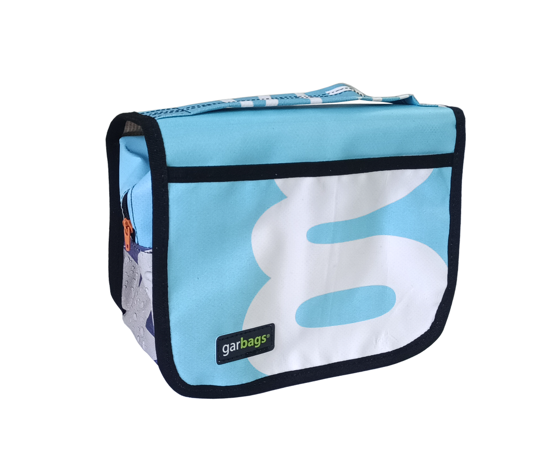 toiletry bag publicity banner blue & white letters
