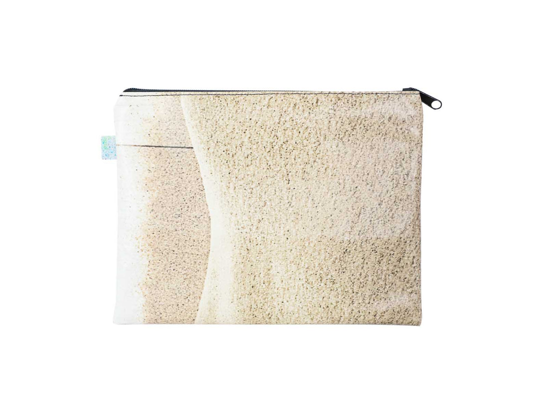beach clutch publicity banner sand