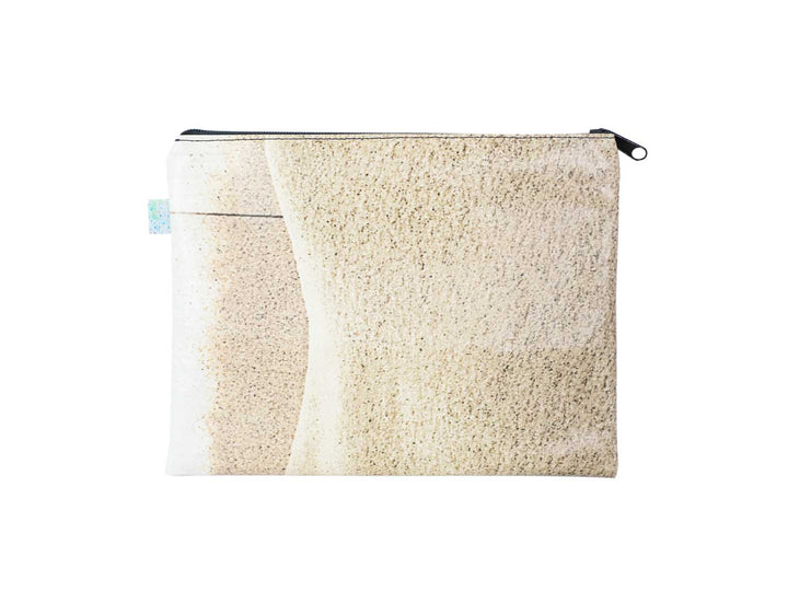 beach clutch publicity banner sand