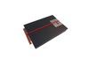 notebook facing down, the elastic of the pencilcase wraps around it vertically